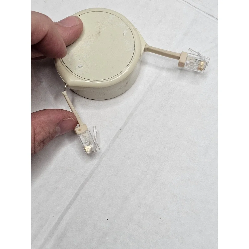 Vintage CORD-Minder Telephone Line Cord Retractor by Presco Beige